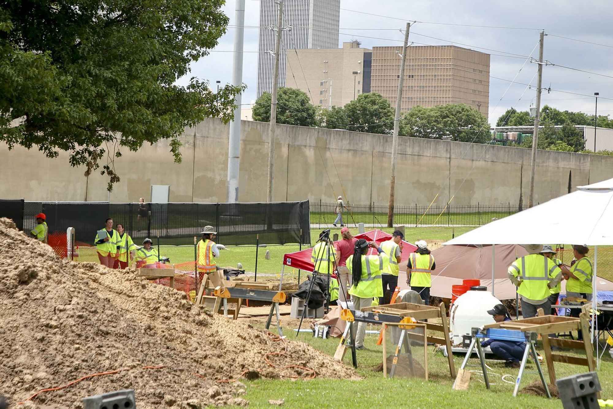 Work continues on excavating remains of possible Tulsa Race Massacre victims at Oaklawn Cemetery on Tuesday, June 8, 2021, in Tulsa, Okla. (Ian Maule/Tulsa World via AP)