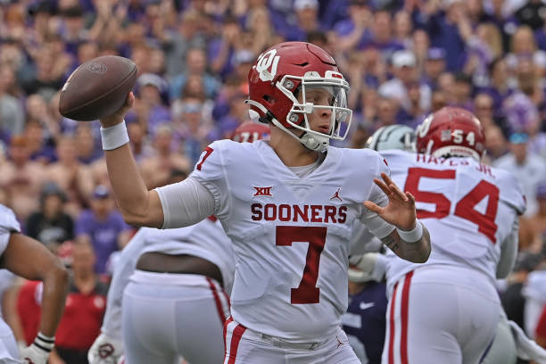MANHATTAN, KS - OCTOBER 02: Quarterback Spencer Rattler #7 of the Oklahoma Sooners throws a pass during the first half against the Kansas State Wildcats at Bill Snyder Family Football Stadium on October 2, 2021 in Manhattan, Kansas. (Photo by Peter Aiken/Getty Images)